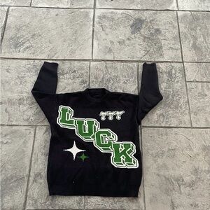 Black 'LUCK' Graphic Sweater with Green & White Accents